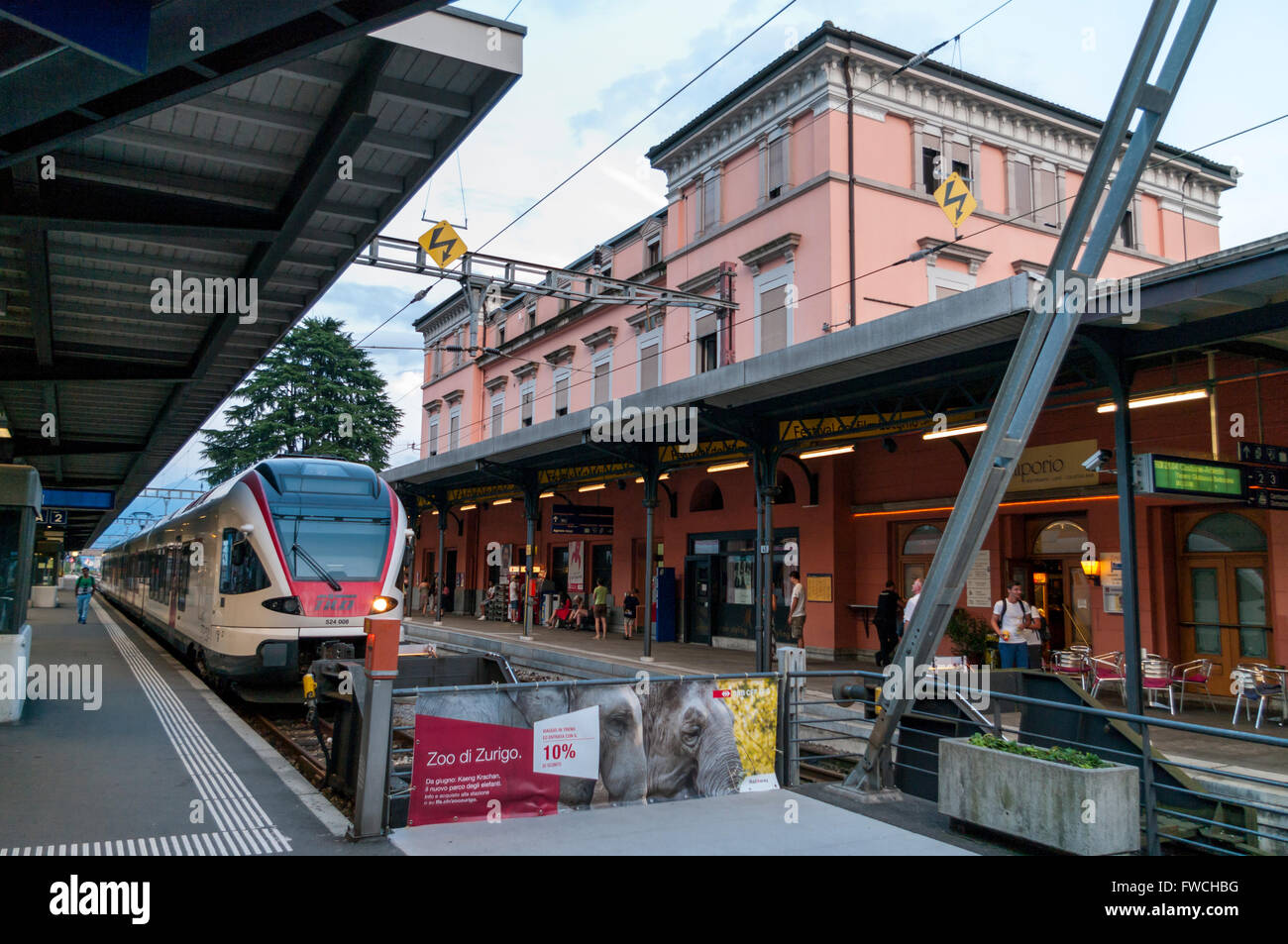 Train station of Locarno, Ticino, Switzerland. SBB RABe 524/ETR 150 TILO regional train waiting for departure. Stock Photo