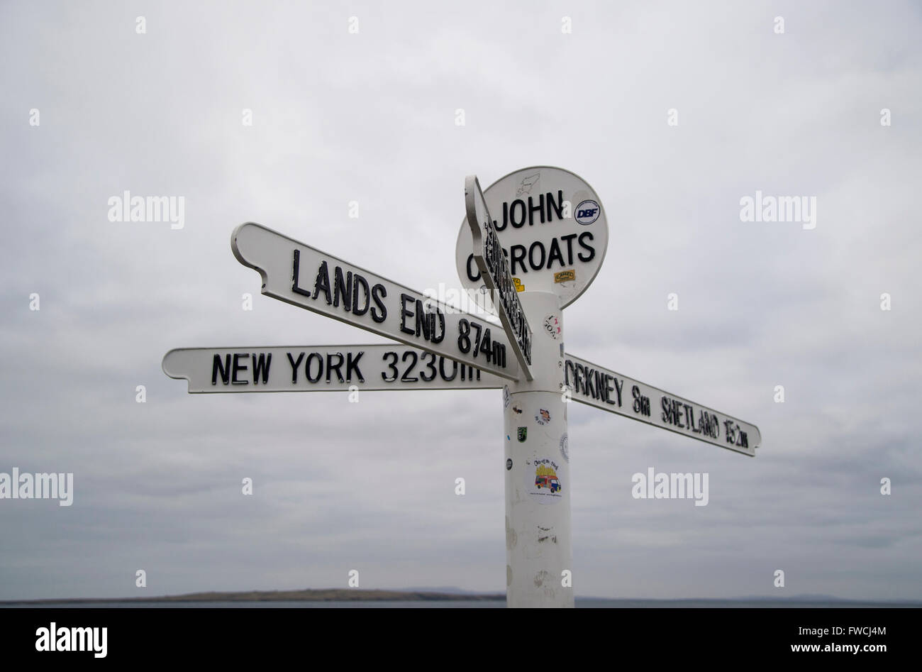 John O'Groats sign at the North Eastern tip of the British mainland, Scottish Highlands, North Coast 500 road trip driving route Stock Photo