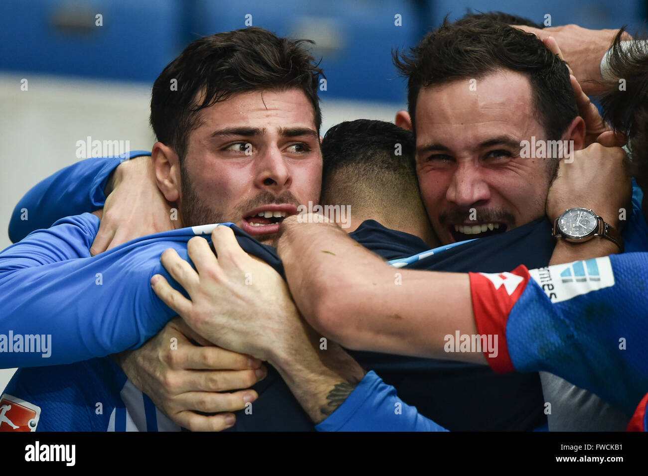 Sinsheim, Germany. 3rd Apr, 2016. Hoffenheim's Kevin Volland (l) celebrating his 1:1 goal with his teammates during the German Bundesliga soccer match between TSG 1899 Hoffenheim and 1. FC Cologne at Rhein-Neckar-Arena in Sinsheim, Germany, 3 April 2016. PHOTO: UWE ANSPACH/dpa (EMBARGO CONDITIONS - ATTENTION: Due to the accreditation guidlines, the DFL only permits the publication and utilisation of up to 15 pictures per match on the internet and in online media during the match.) © dpa/Alamy Live News Stock Photo