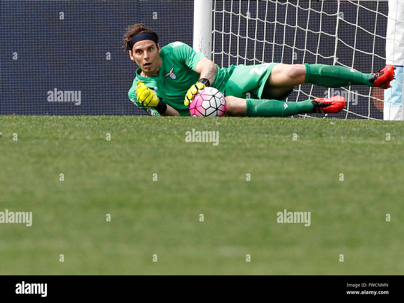 Rome, Italy. 03rd Apr, 2016. Lazio's goalkeeper Federico Marchetti holds the ball during the Italian Serie A football match between Lazio and Roma at the Olympic stadium. Roma defeats Lazio's city rivals 4-1. Goals were scored by El Shaarawy, Dzeko, Florenzi and Perotti for Roma, Parolo for Lazio. © Riccardo De Luca/Pacific Press/Alamy Live News Stock Photo