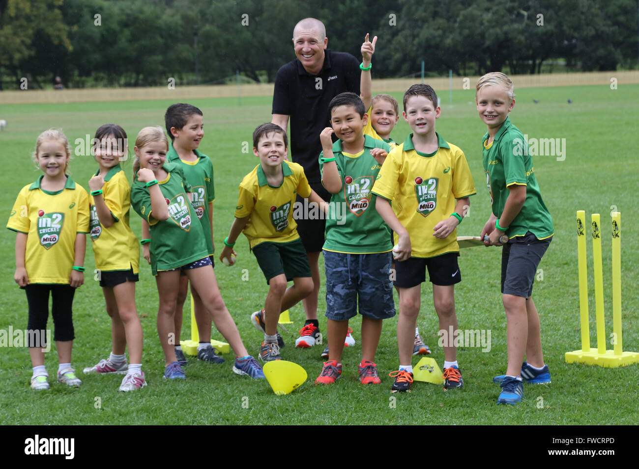 Sydney, Australia. 4 April 2016. New research reveals that Australian parents are increasingly worried about their couch potato kids; the majority of Australian children are getting less than half the recommended daily amount of exercise. In an effort to encourage kids to get active and eat a healthy diet, Brad Haddin completed drills and with junior cricketers from Cricket Australia.  As a Dad of three, Brad also tested a new kids fitness tracker by Milo that helps parents monitor their kids activity levels and dietary intake through an interactive app. Credit: Richard Milnes/Alamy Live News Stock Photo