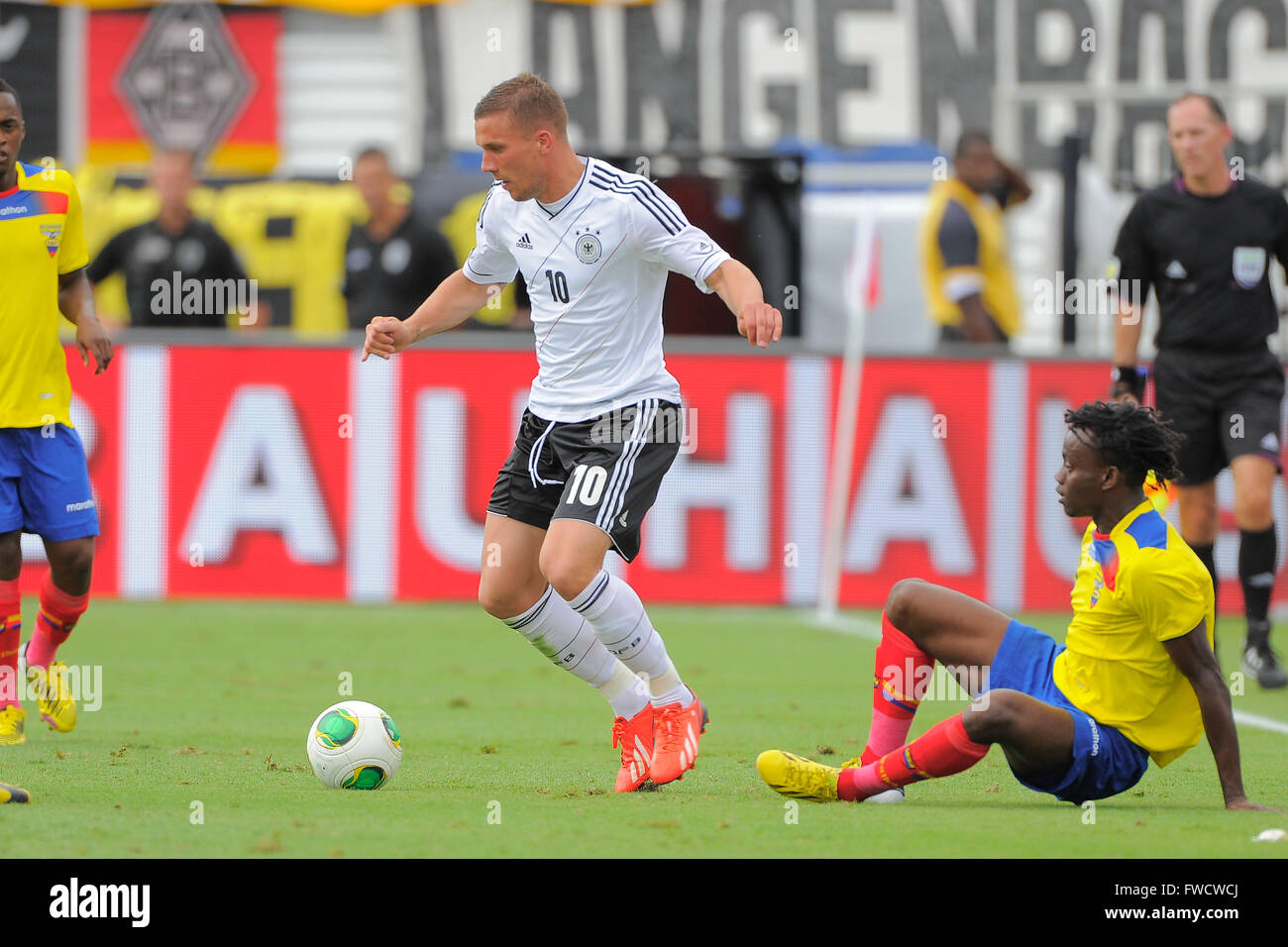 Boca Raton, FL, USA. 29th May, 2013. Germany midfielder Lukas Podolski (10) and Ecuador defender Juan Carlos Paredes (4) fight for the ball during an international friendly at FAU Stadium in Boca Raton, Florida on May 29, 2013. Germany won 4-2.ZUMA PRESS/Scott A. Miller © Scott A. Miller/ZUMA Wire/Alamy Live News Stock Photo