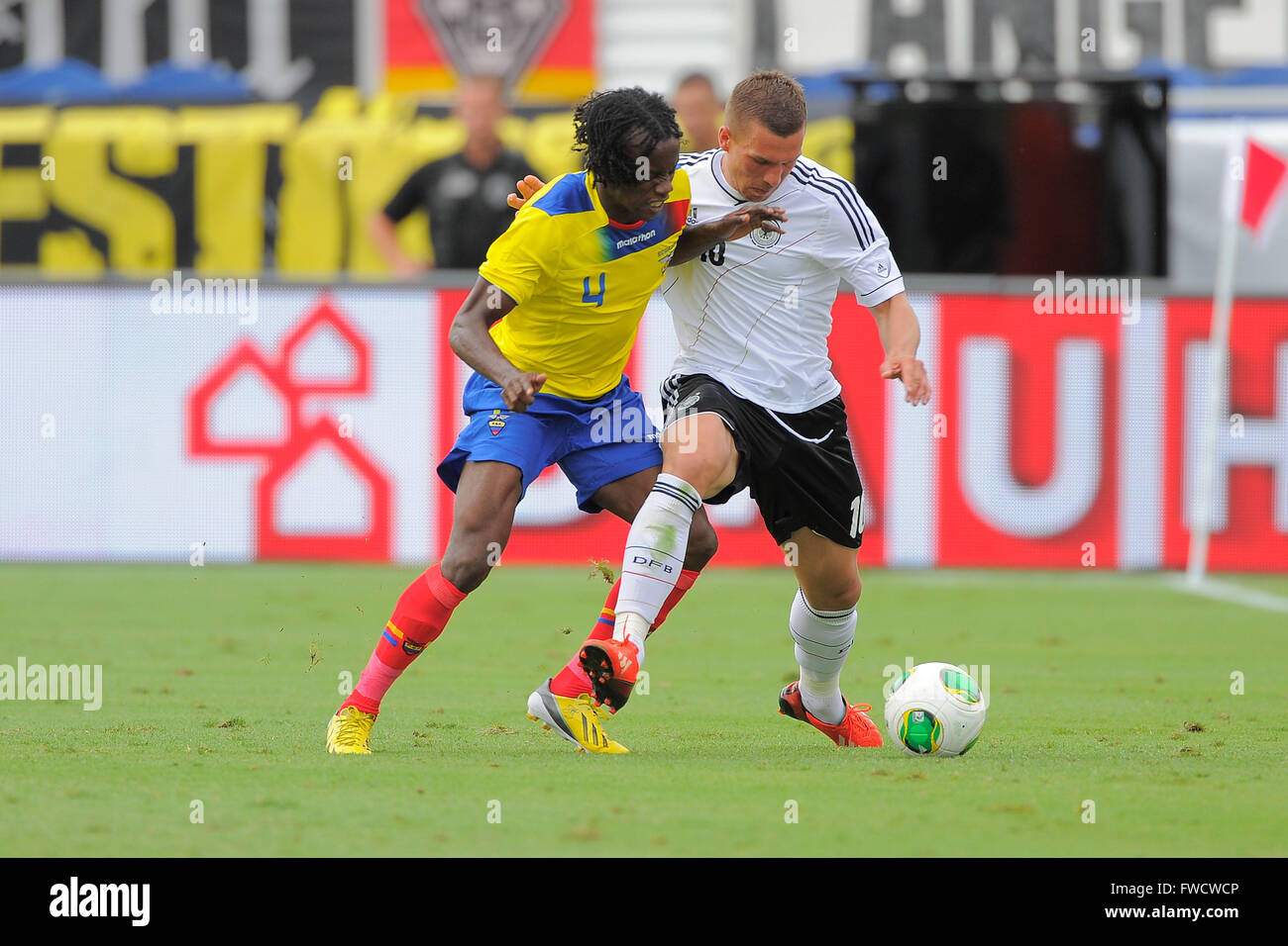 Boca Raton, FL, USA. 29th May, 2013. Germany midfielder Lukas Podolski (10) and Ecuador defender Juan Carlos Paredes (4) fight for the ball during an international friendly at FAU Stadium in Boca Raton, Florida on May 29, 2013. Germany won 4-2.ZUMA PRESS/Scott A. Miller © Scott A. Miller/ZUMA Wire/Alamy Live News Stock Photo