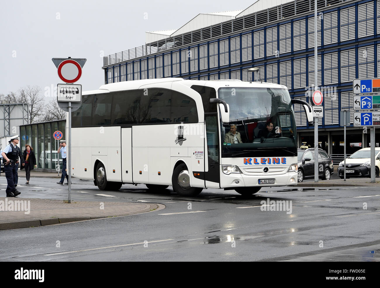Hanover, Germany. 04th Apr, 2016. A bus leaves for the reception center ...