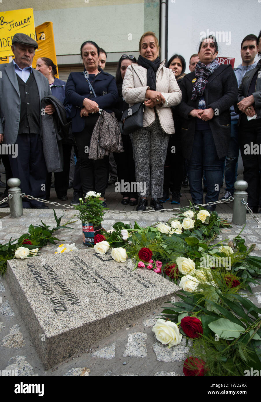 Dortmund, Germany. 4th Apr, 2016. The widow Elif Kubasik (2nd l) as well as family members and representatives of the city of Dortmund commemorate the cinema owner Mehmet Kubasik, murdered by the NSU terror group, in Dortmund, Germany, 4 April 2016. 10 years ago, Kubasik became the eighth victim of the Neonazi terror group. PHOTO: BERND THISSEN/dpa/Alamy Live News Stock Photo