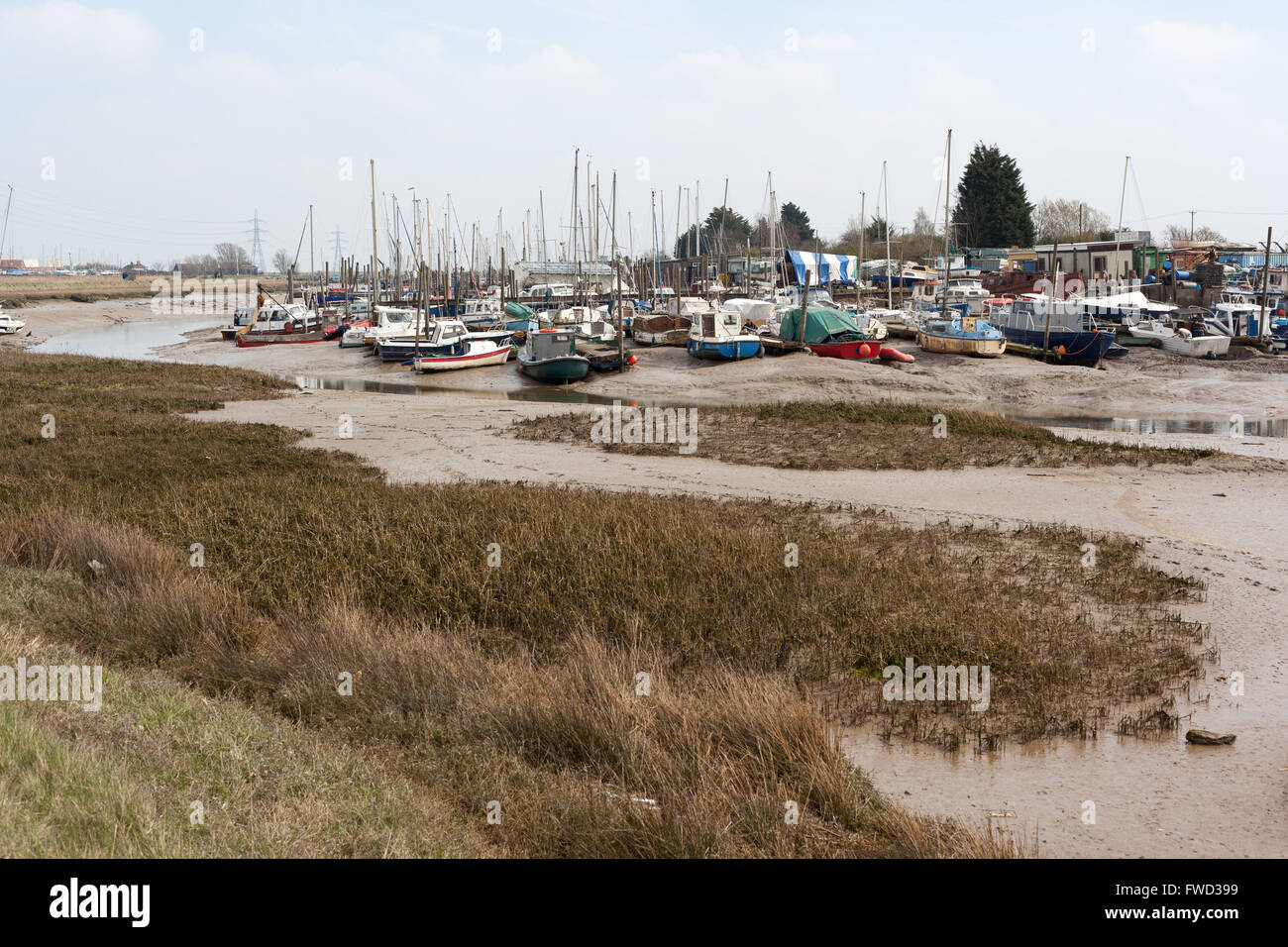 Boats and yachts moored in Oare creek, Kent. Stock Photo