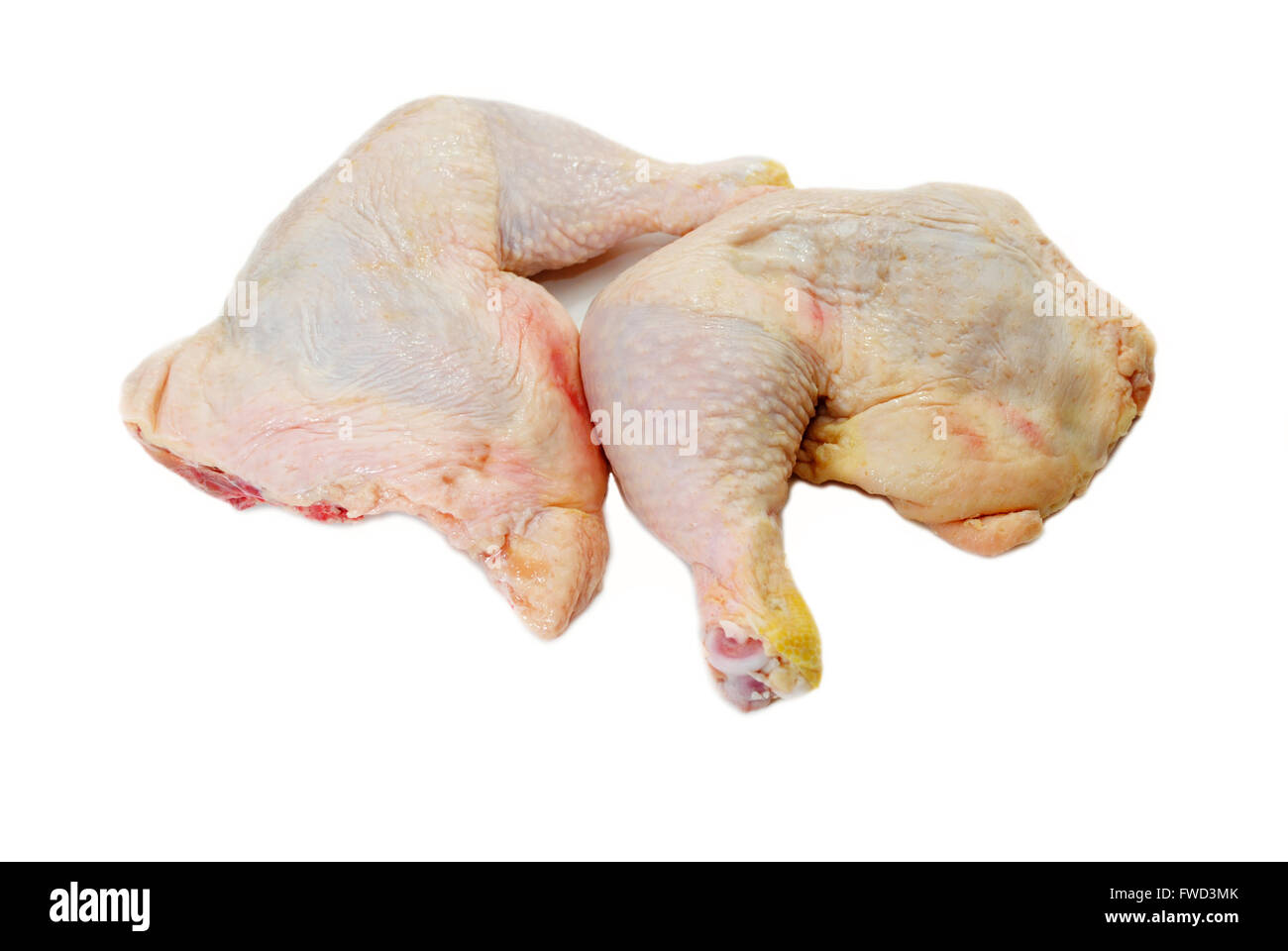 Two Raw Chicken Leg Quarters on White Stock Photo Alamy