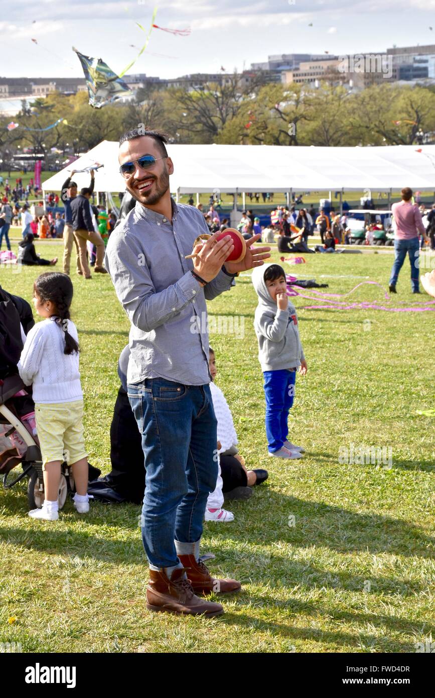 Tourist flying a kite during the Cherry blossom festival in Washington