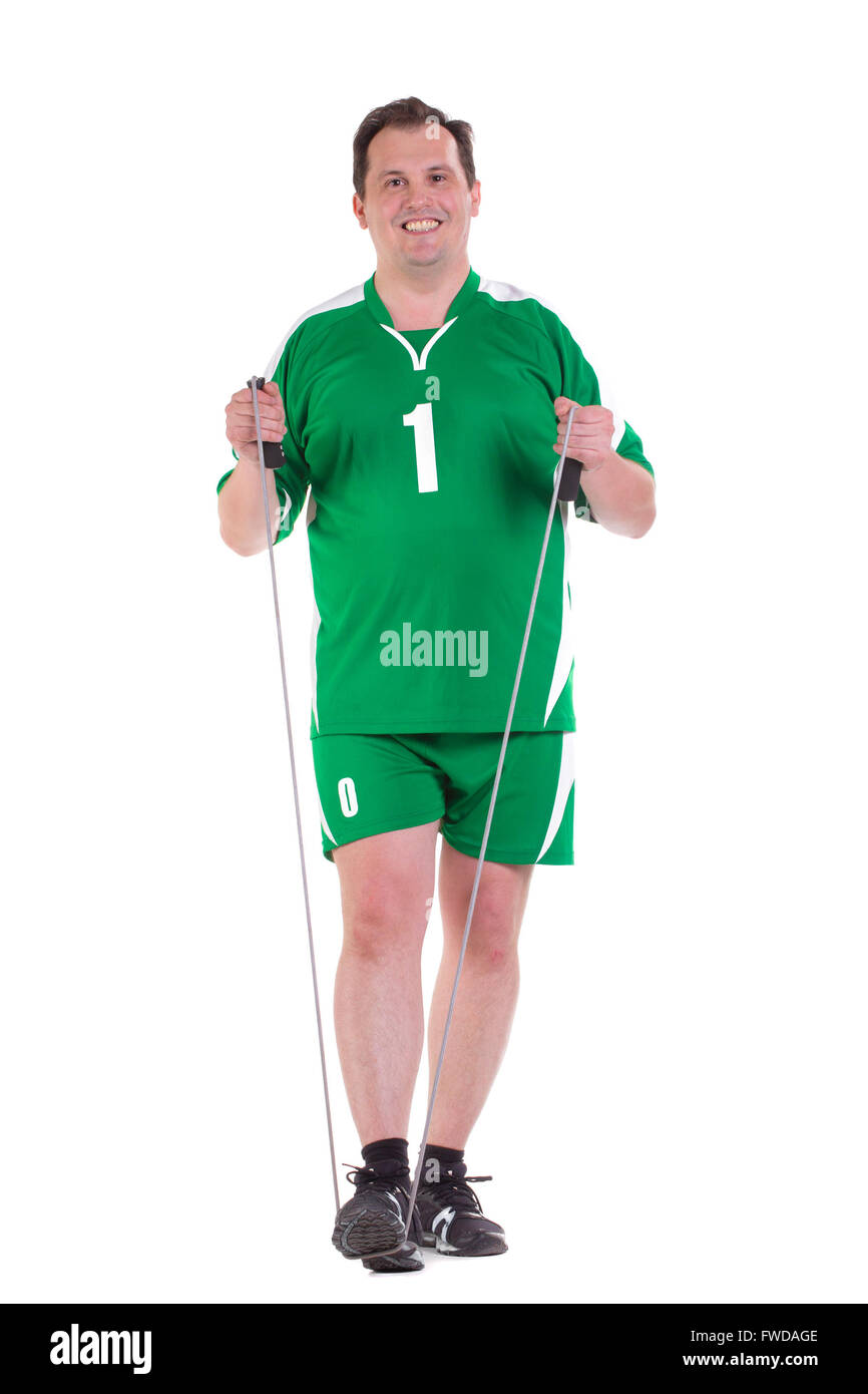 Adult man in sport green uniform with skipping rope, isolated on white Stock Photo