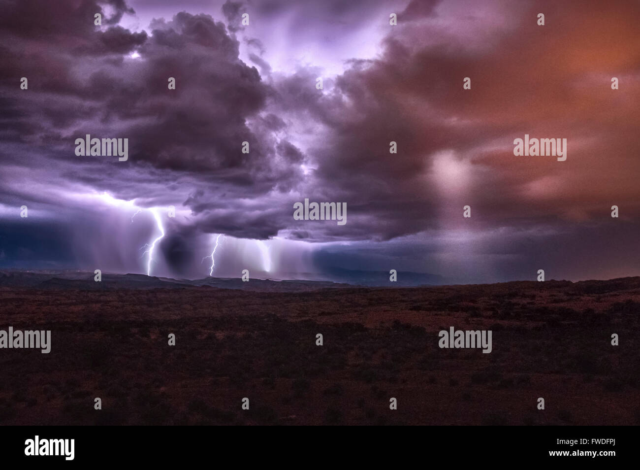 A powerful lightning storm rages through the desert of Arches National