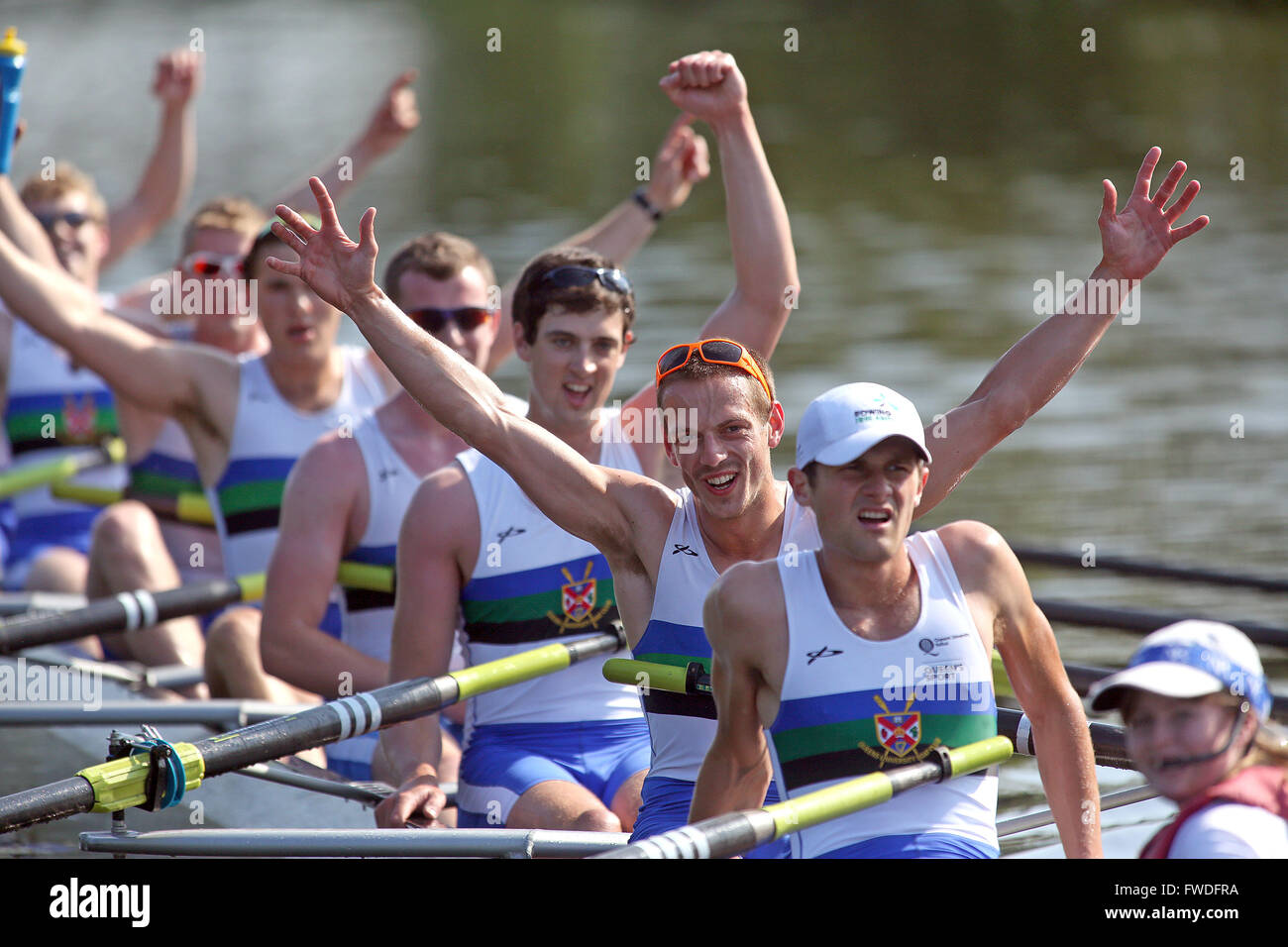 Queen's University Rowers Donald Evans (Position 7) and crew celebrate