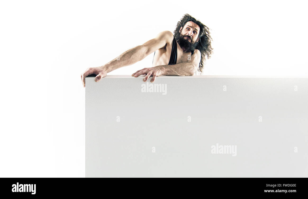 Funny nerdy guy holding an empty board isolated on white background Stock Photo