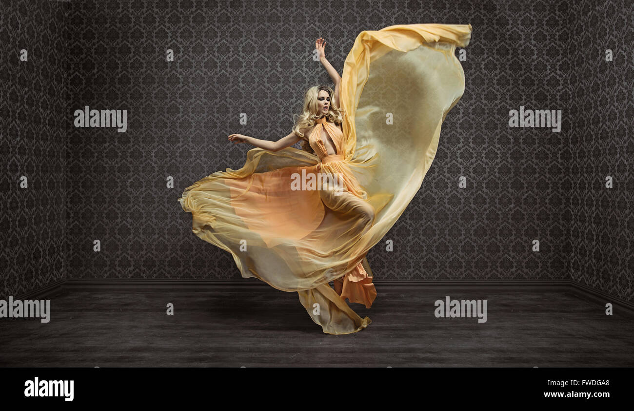 Gorgeous expressive blond woman wearing fabulous dress Stock Photo - Alamy