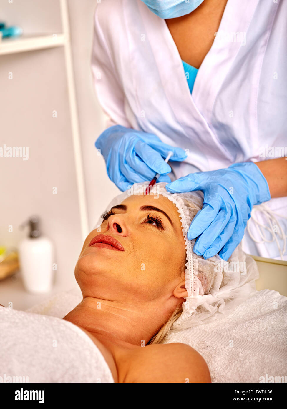 Doctor giving injections girl hi-res stock photography and images - Alamy