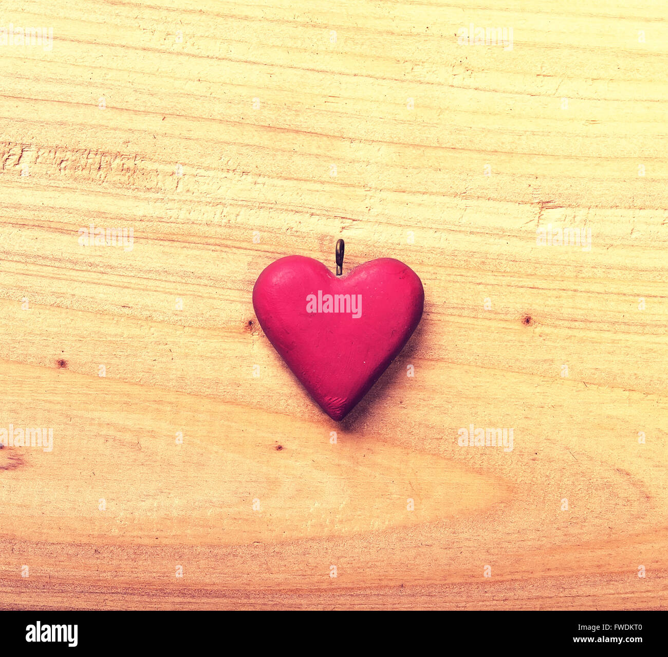 red heart on old shabby wooden background Stock Photo - Alamy