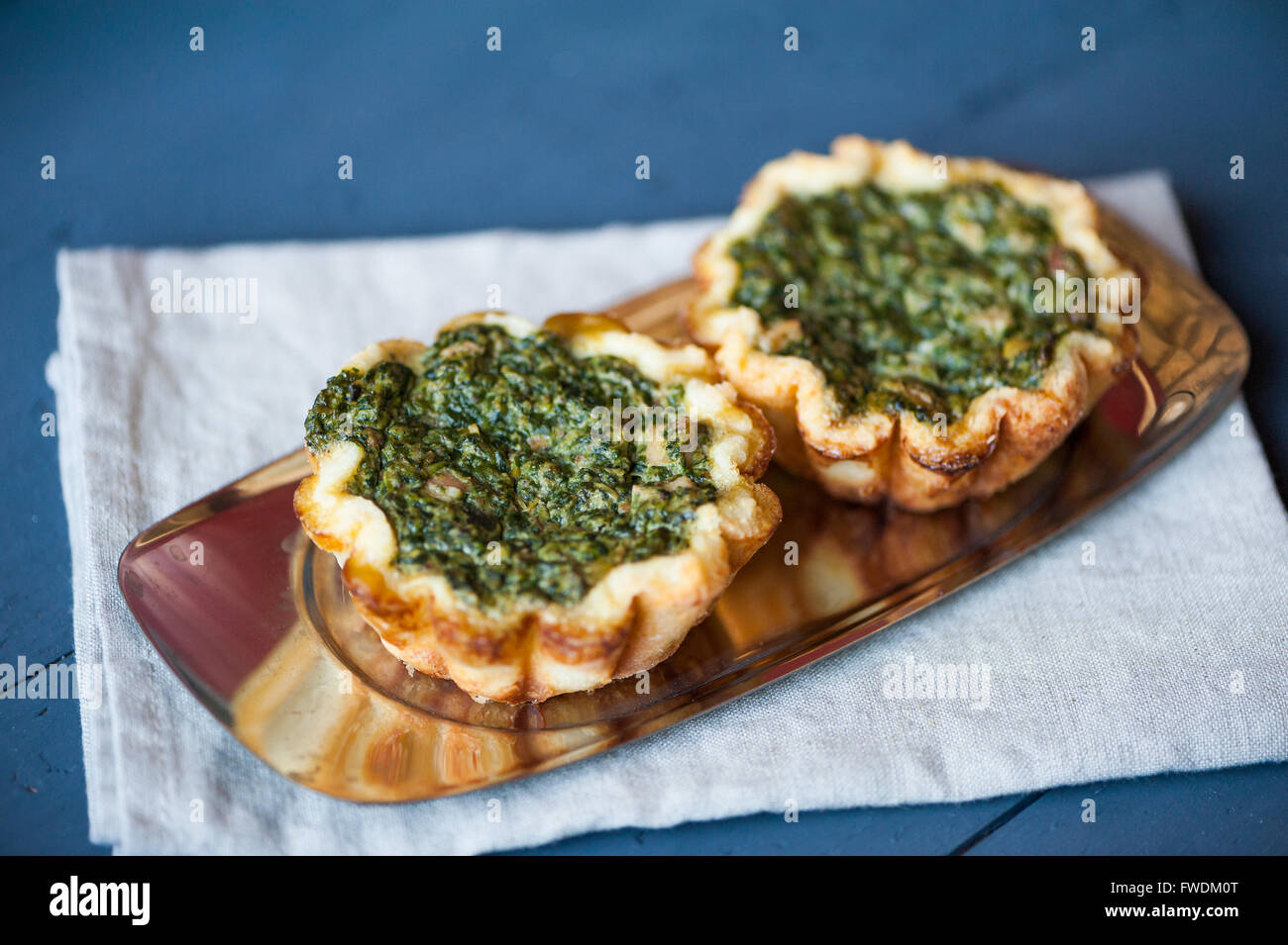 Mini spinach and goat cheese tart Stock Photo Alamy