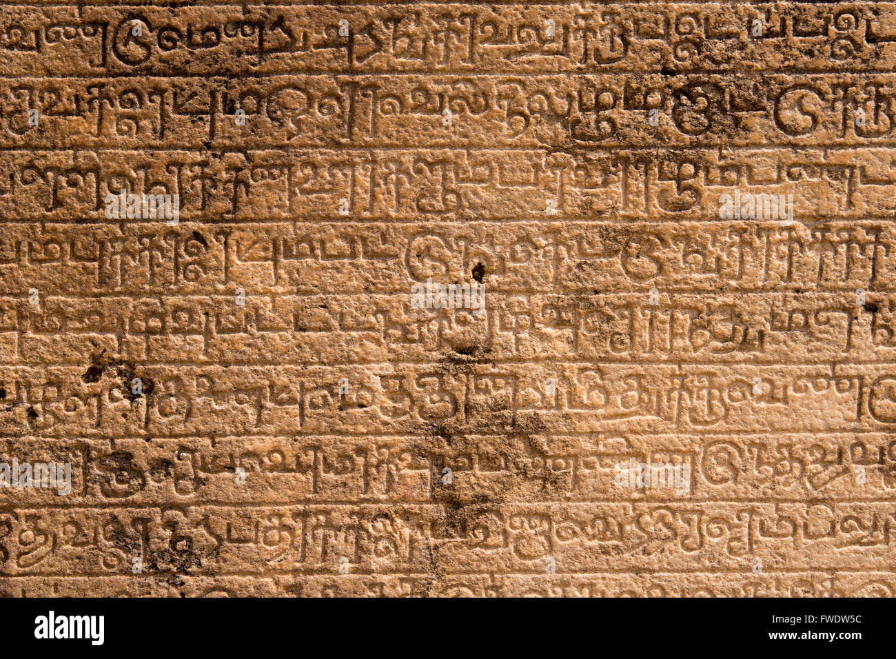 Sri Lanka, Polonnaruwa, Quadrangle, pillar with ancient stone inscription in Sinhalese script Stock Photo