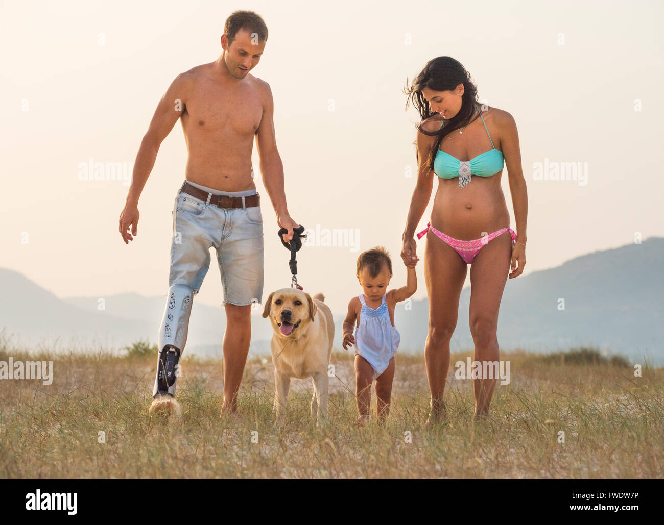 prosthetic leg child stock photos \u0026 prosthetic leg child stockfather with a prosthetic leg and his family at the beach stock image