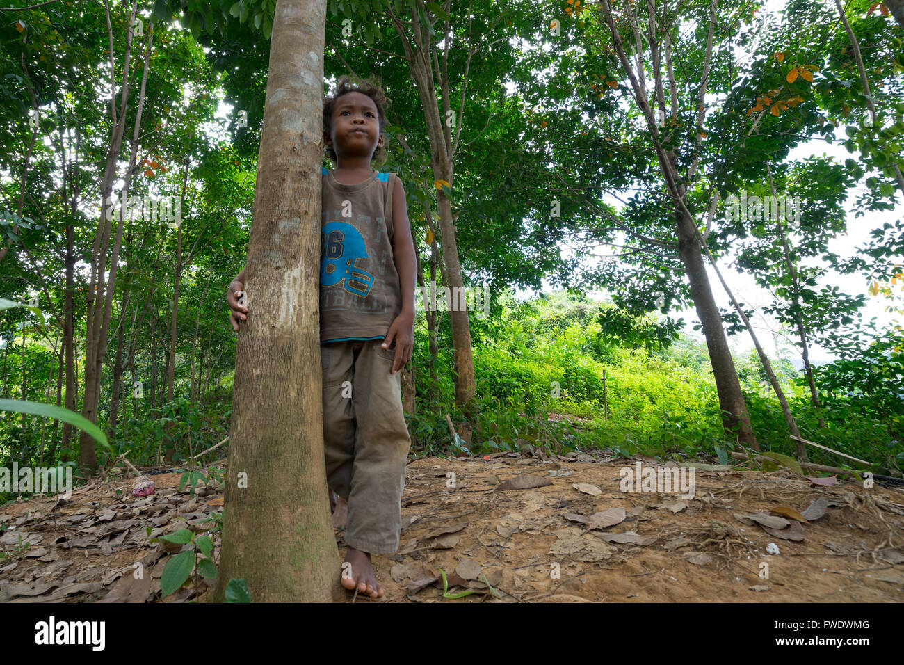 Kids from Jahai tribe (aboriginal people) in Royal Belum national rainforest park. Perak, Malaysia. Stock Photo