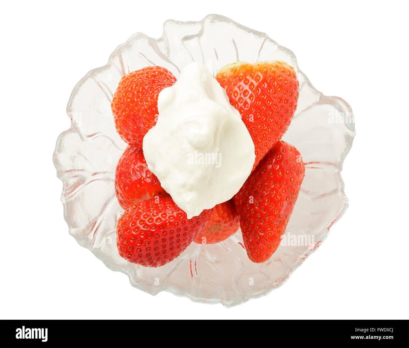 Fresh strawberries and cream in a glass bowl Stock Photo