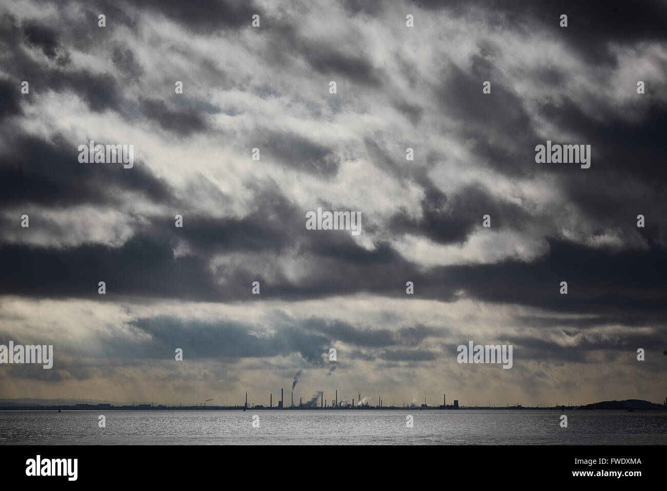 from West Float Merseyside Liverpool docks birkenhead    River Mersey copyspace dull day grey gray clouds weather I STANLOW Stan Stock Photo