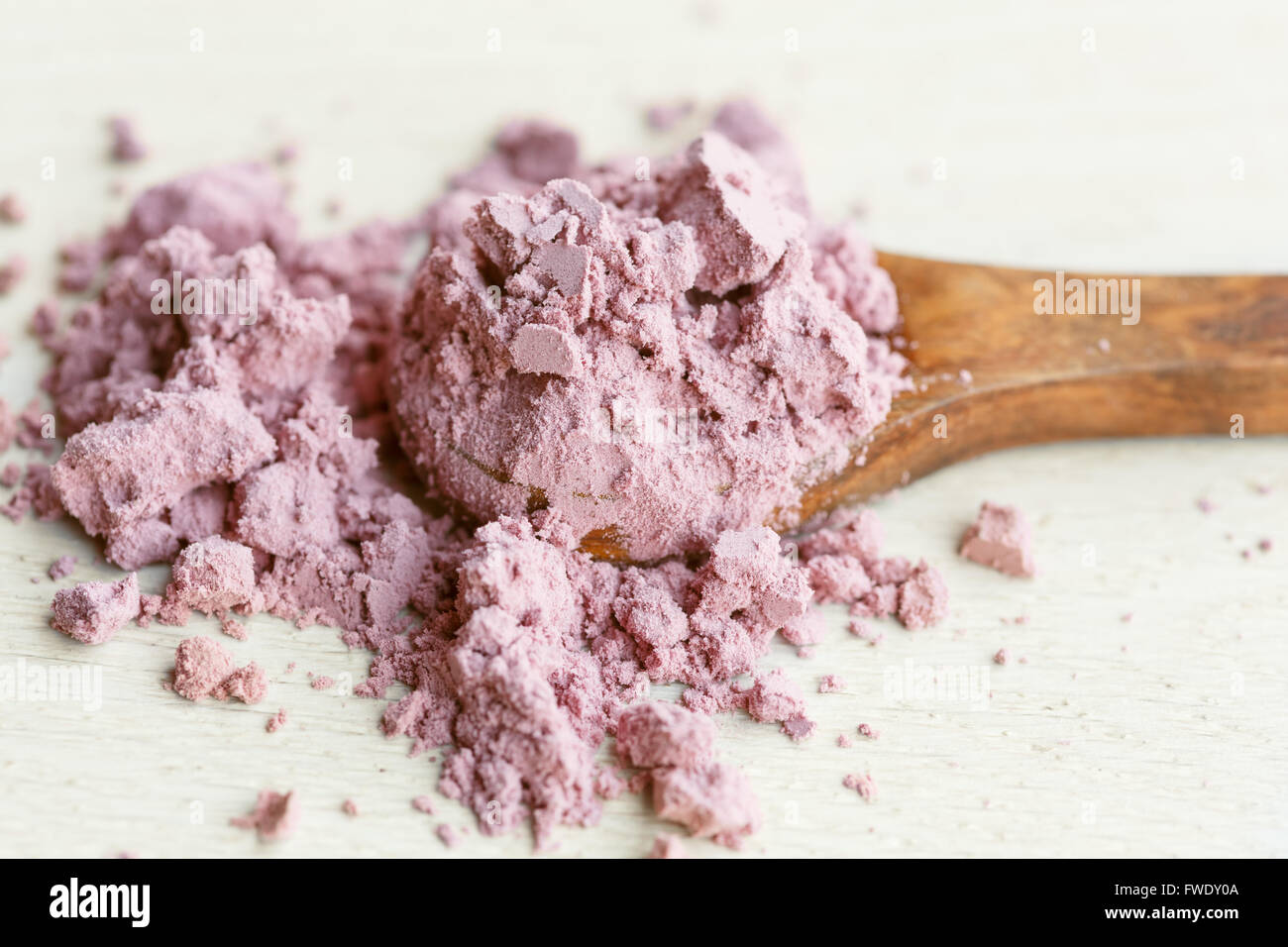 Acai powder on wooden spoon Stock Photo Alamy