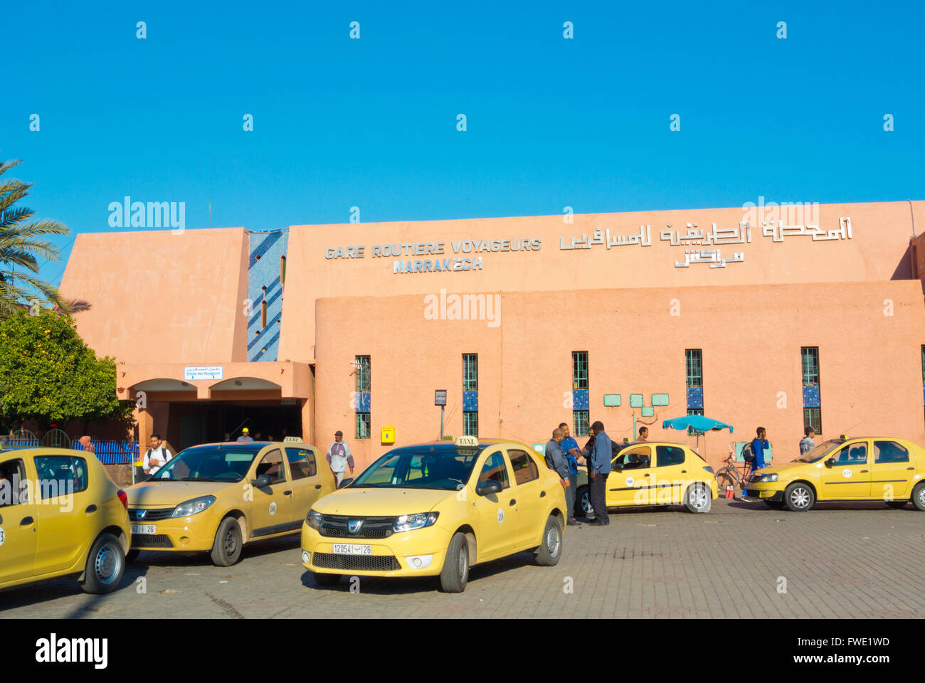 Taxis, outside bus station, Bab Doukkala, Marrakesh, Morocco, northern Africa Stock Photo