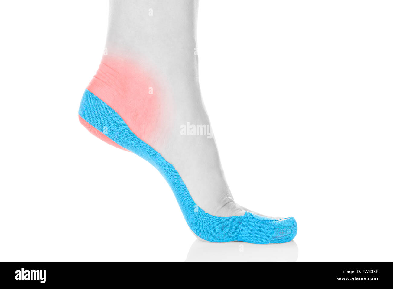 Therapeutic tape on female foot isolated on white background. Chronic pain, alternative medicine. Rehabilitation, physiotherapy Stock Photo