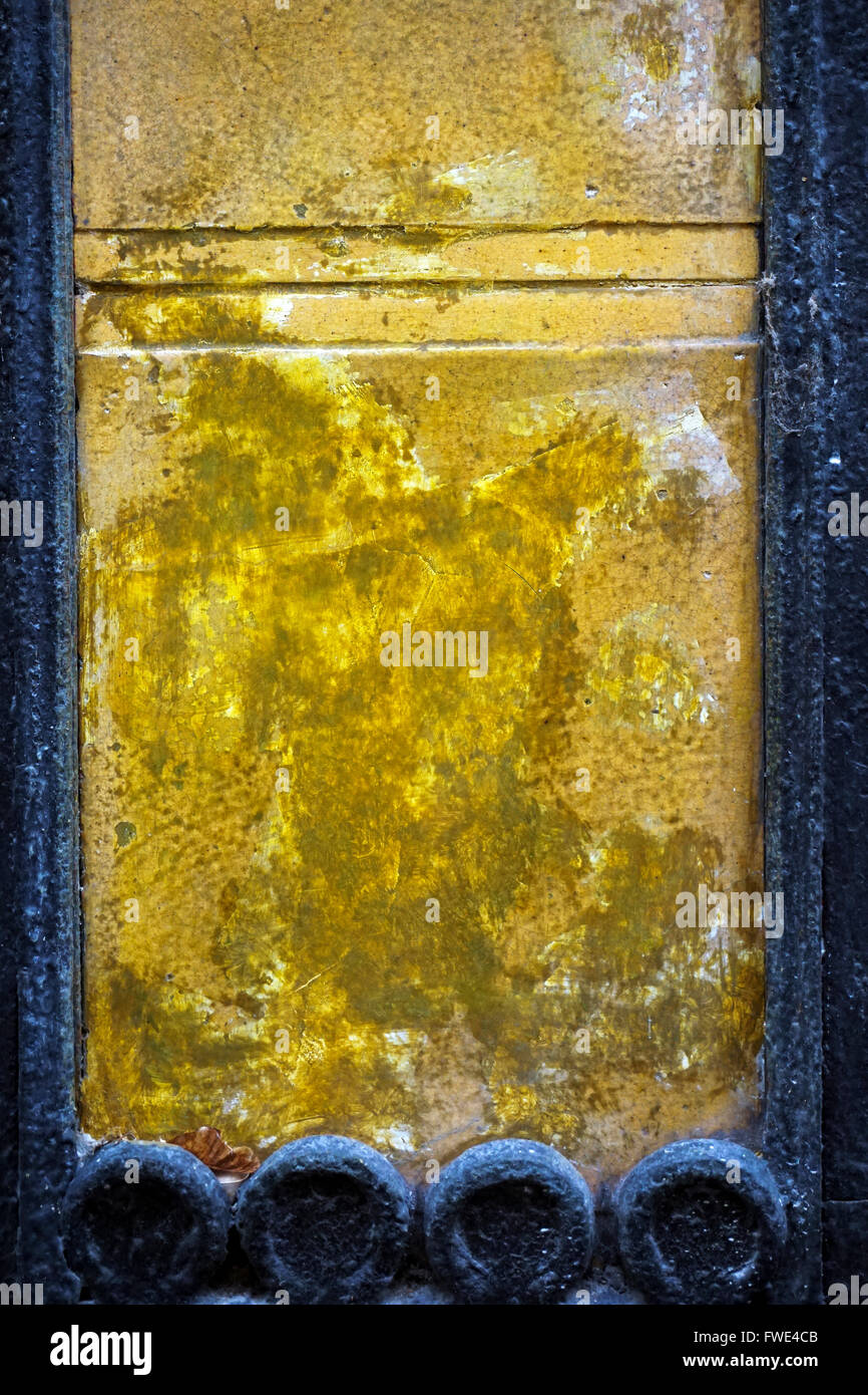 Gold colored chipped wall background Stock Photo - Alamy