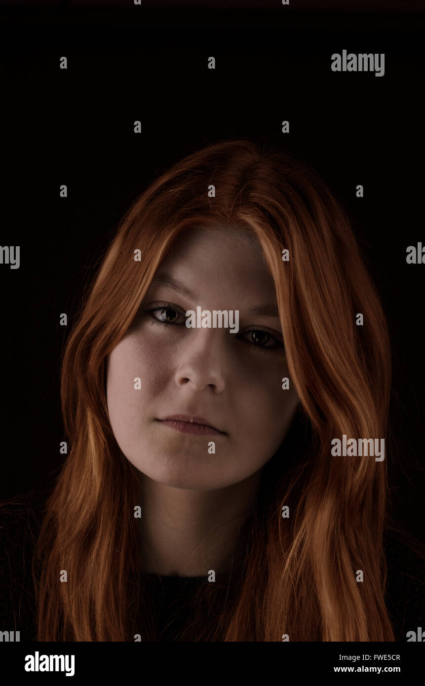 Portrait of a sad young woman Stock Photo - Alamy