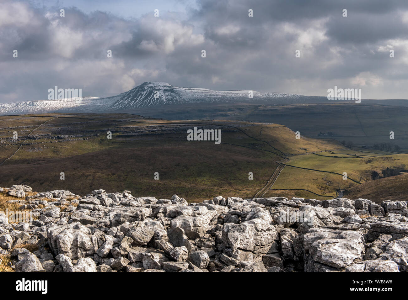 Ingleborough seen from the limestone pavements on Tow Scar Stock Photo