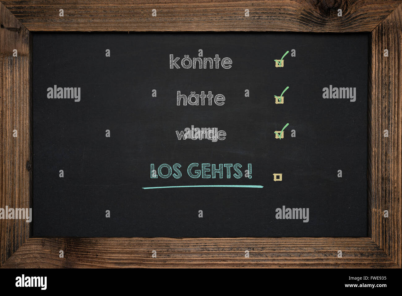 Chalkboard handwriting business success in German Stock Photo Alamy