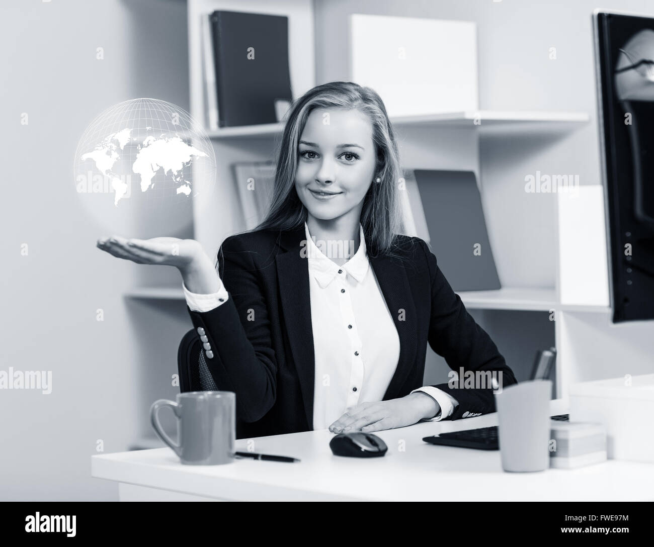 Young business woman present digital map Stock Photo - Alamy