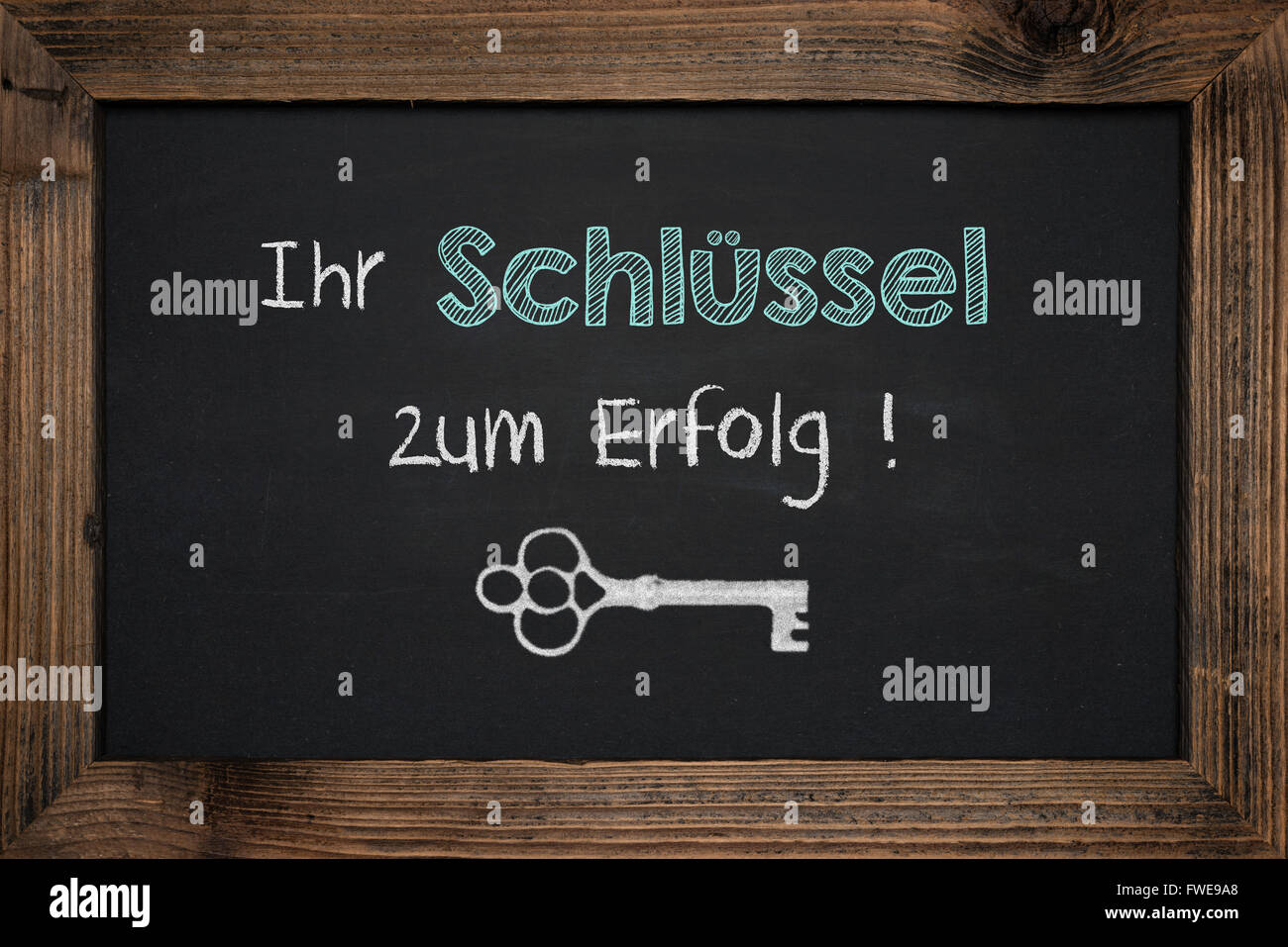 Chalkboard handwriting business success in German Stock Photo Alamy