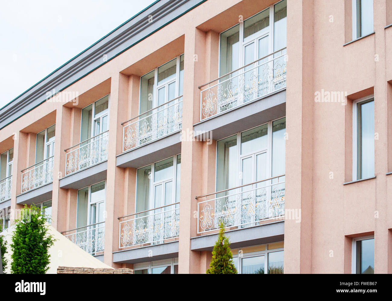 beautiful balconies of high-rise architectural luxury building Stock Photo