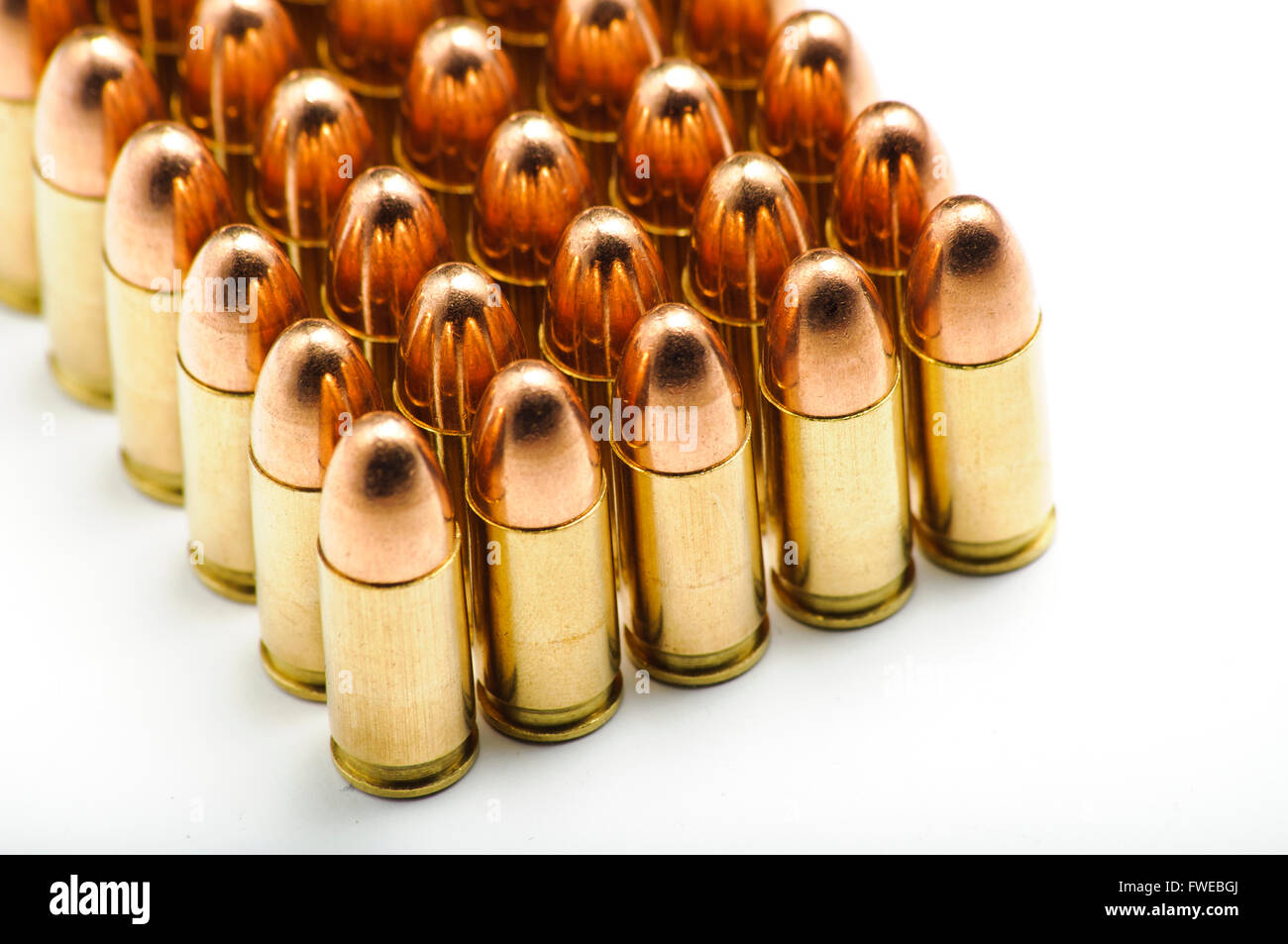 9mm bullets in a row Stock Photo Alamy