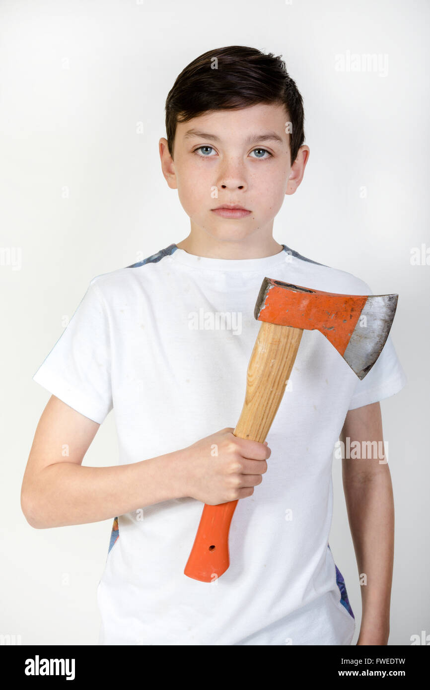 Young boy holding an axe Stock Photo Alamy