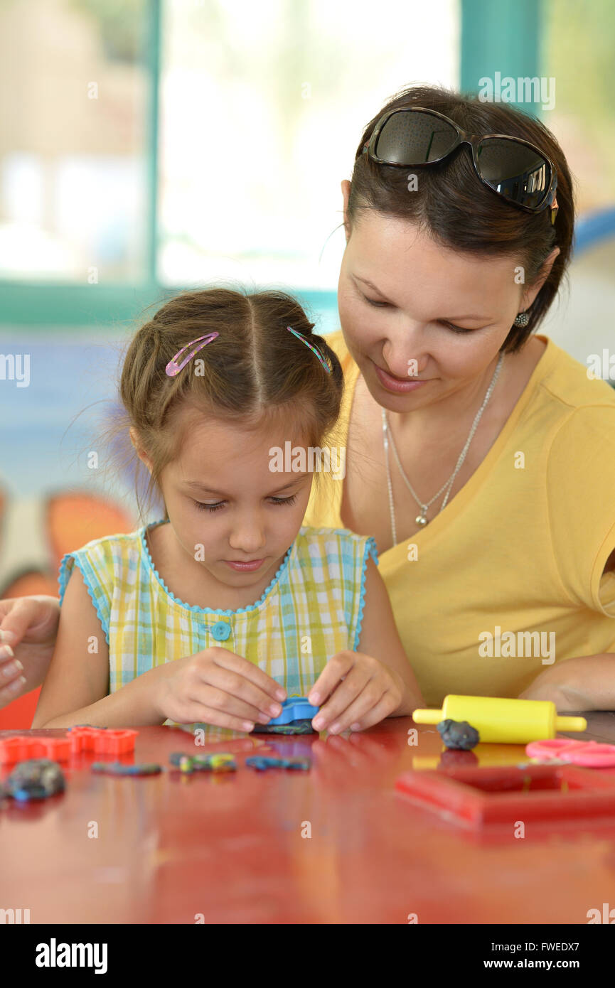 Little Girl Playing With Mother Stock Photo Alamy little-girl-playing-with-mother-stock-photo-alamy