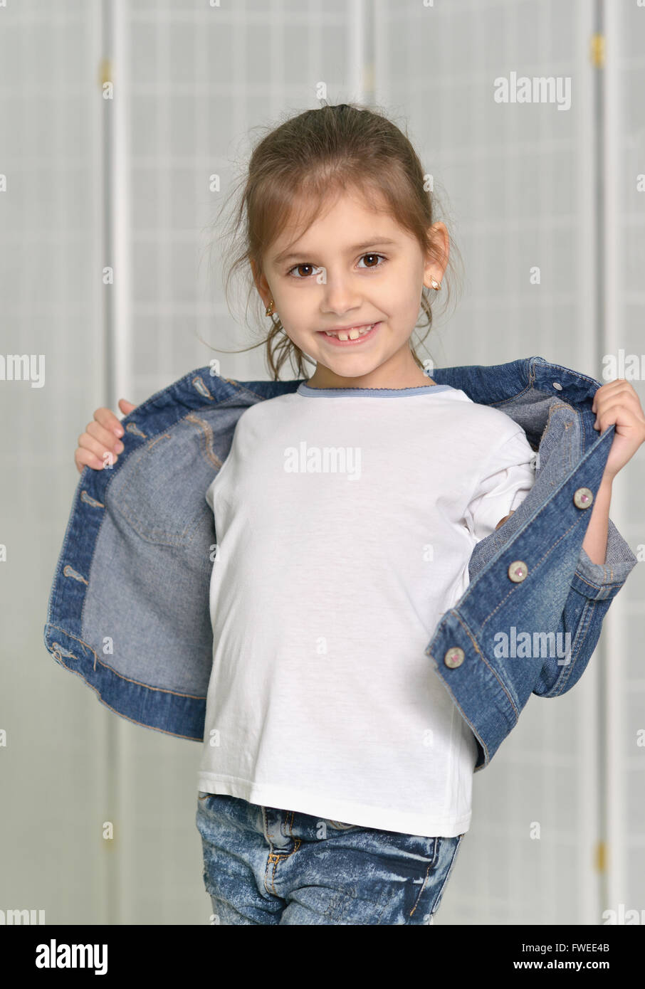 cute little girl posing at home Stock Photo - Alamy