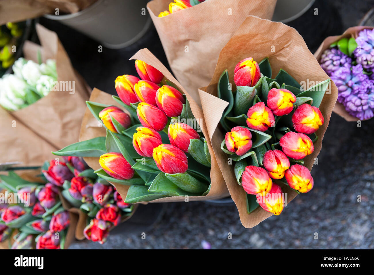 Fresh cut tulips and other flower bouquets on retail display Stock Photo Alamy