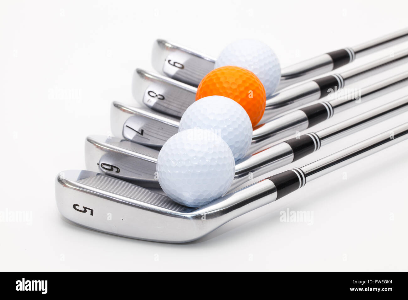 Titanium golf clubs on the white background Stock Photo Alamy