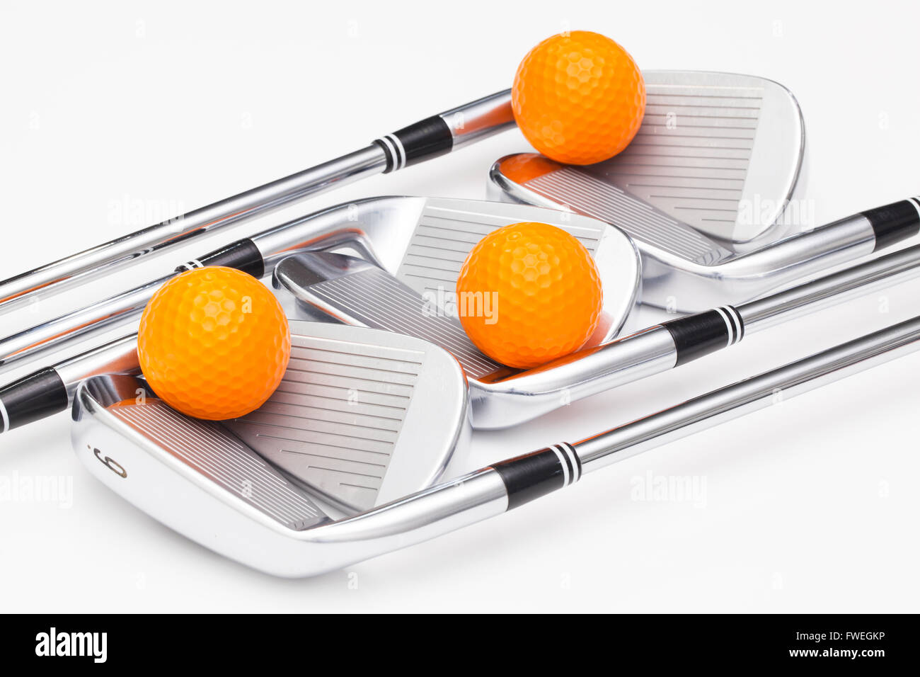 Titanium golf clubs on the white background Stock Photo Alamy