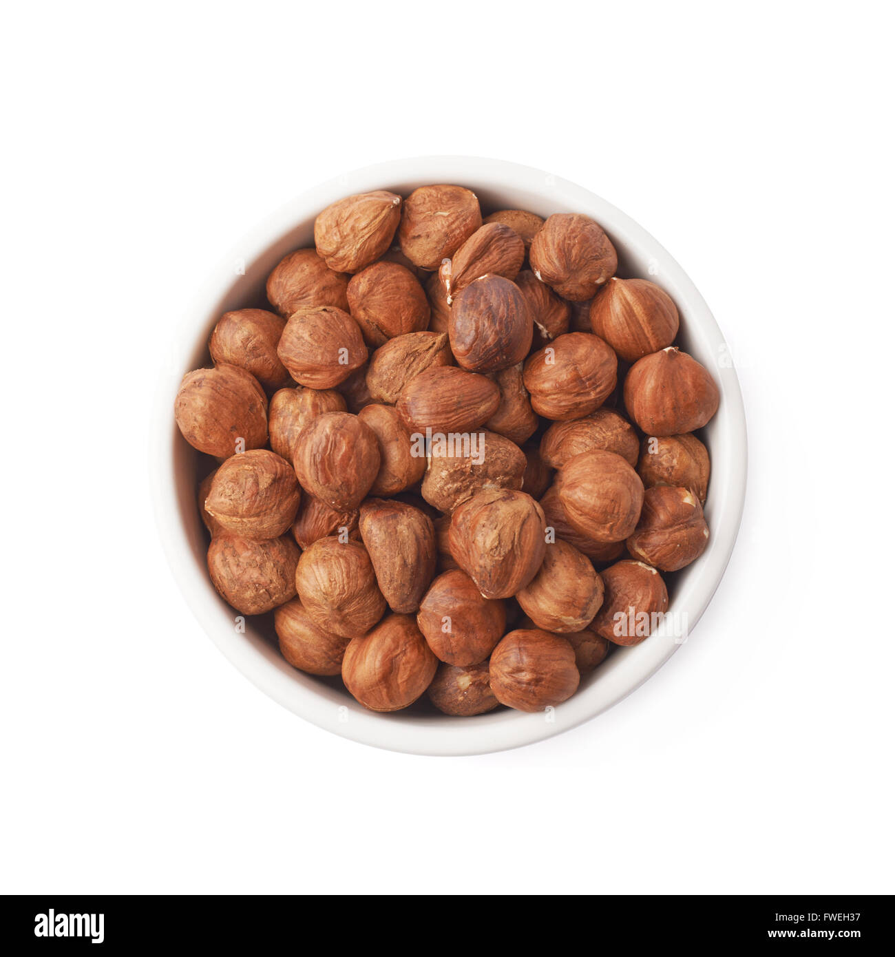 Cup filled with the hazelnuts isolated Stock Photo Alamy