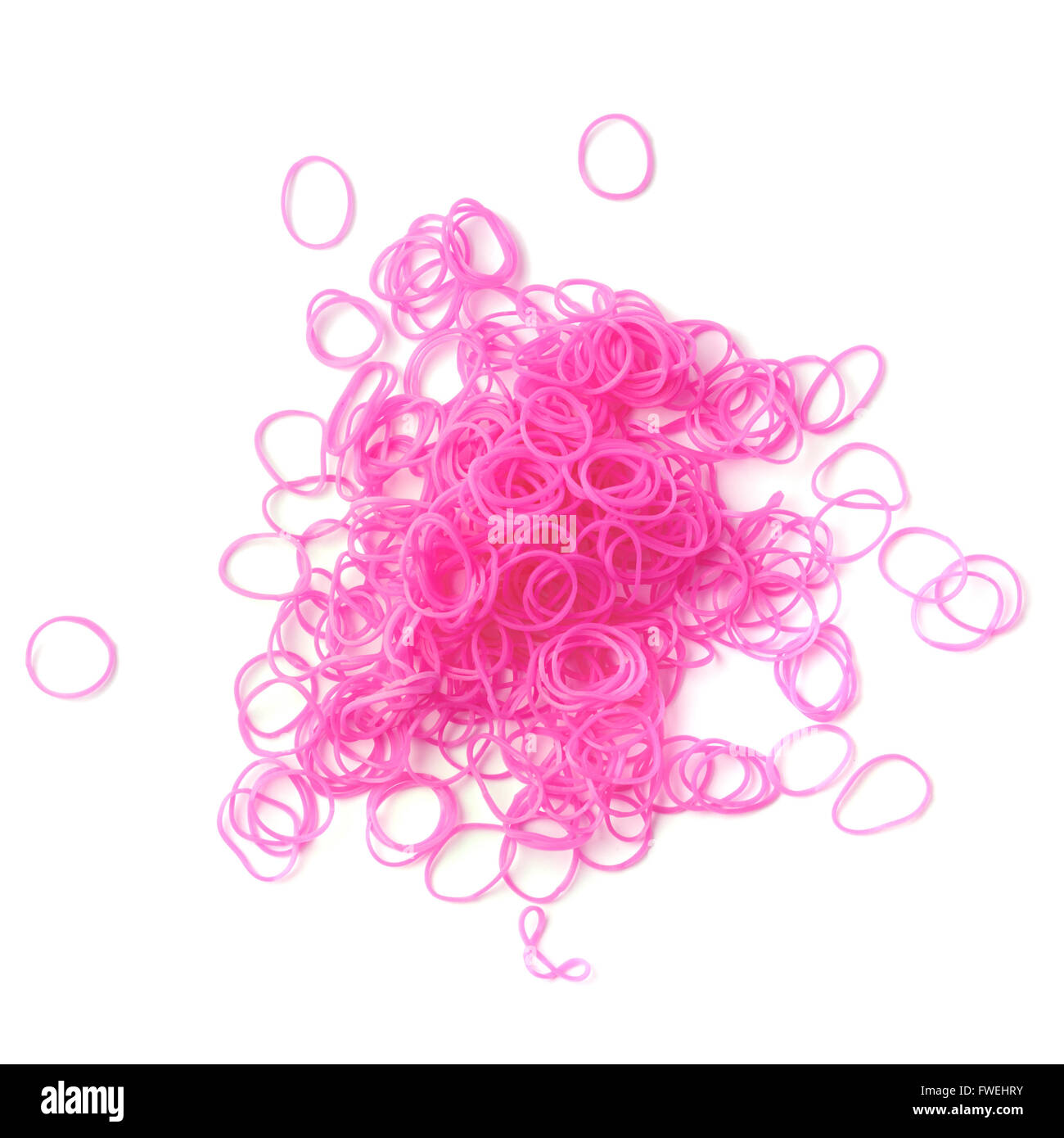 Pile pink rubber loom bands hi-res stock photography and images - Alamy