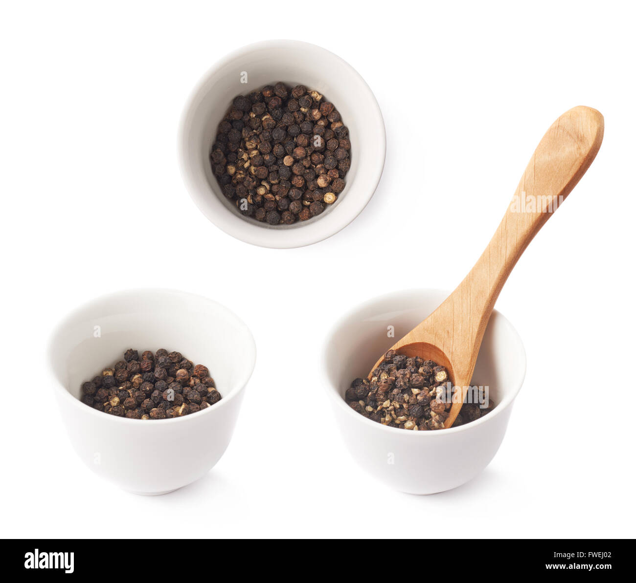 Cup filled with black peppercorn Stock Photo