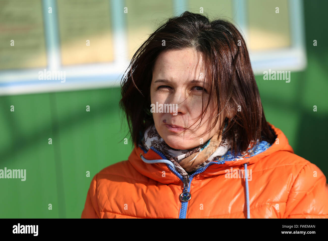 Portrait of a girl wearing a hat close up. karting track Stock Photo