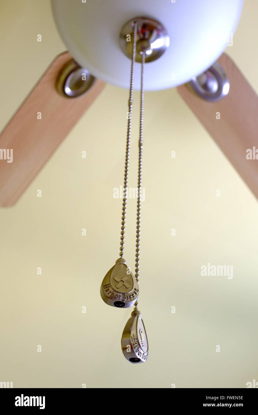 A Ceiling Fan Switch Hanging From A Cord Stock Photo 101742186