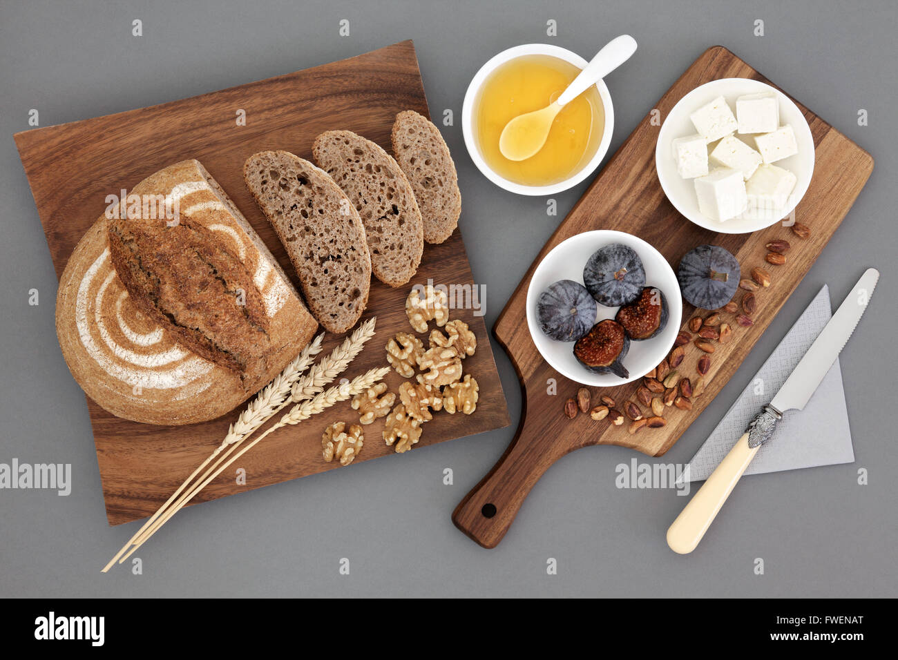 Greek snack food with feta cheese, honey, figs, walnuts and pistachio