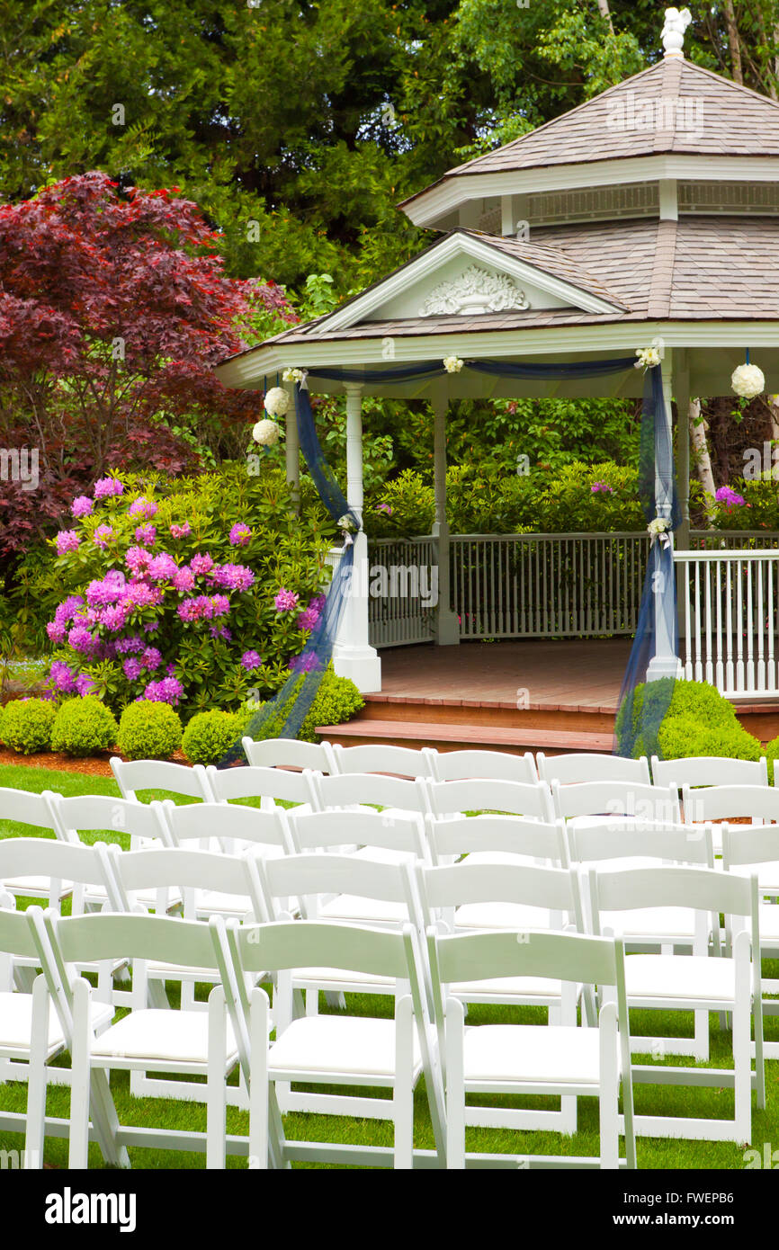 Outdoor Wedding Venue In Oregon With Green Grass And Chairs Ready