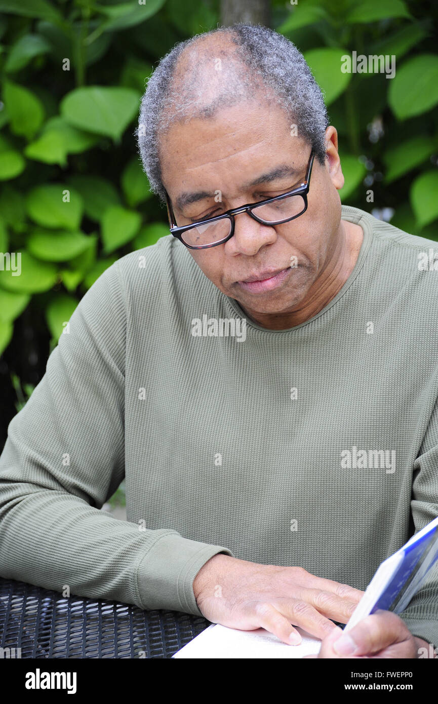 African american male reading Stock Photo - Alamy